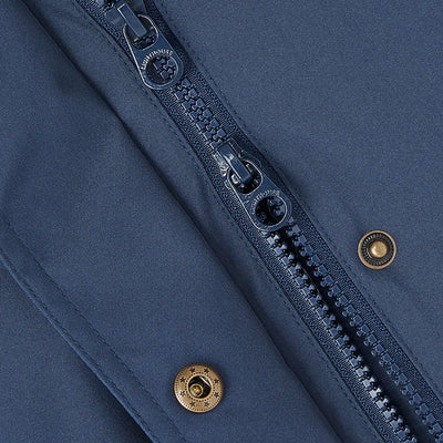 Close-up of blue zipper with brass snaps on Lighthouse Imogen Ladies Coat