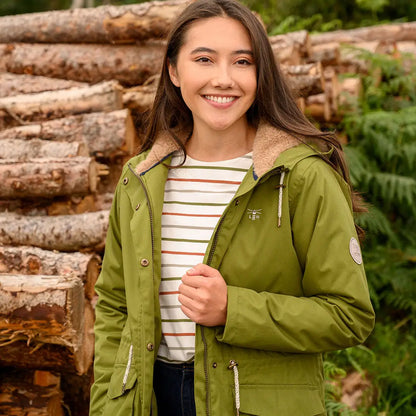 Woman modeling the Lighthouse Isobel Coat with green hooded jacket and striped shirt