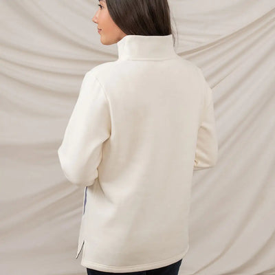 Cream-colored turtleneck sweatshirt from Lighthouse Ladies Haven II Jersey collection