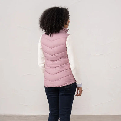 Pink quilted Lighthouse Laurel ladies gilet over white long sleeve shirt for stylish layering