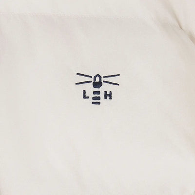 White short-sleeved top with dark blue lighthouse embroidery for Lighthouse Margot Ladies coat