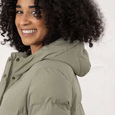 Woman in sage green Lighthouse Savannah Coat with hood, stylish Savannah coat look
