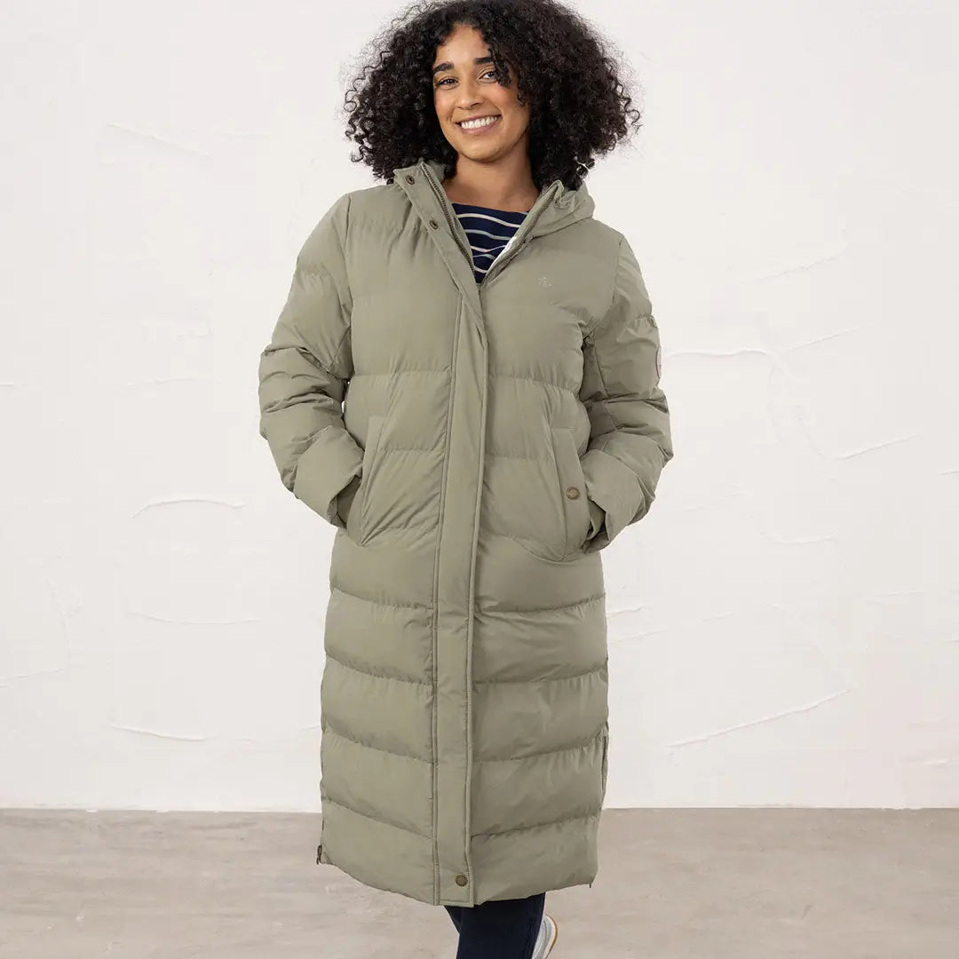 Long sage green Lighthouse Savannah Coat with hood perfect for chilly days