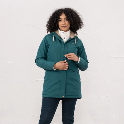Woman in green Lighthouse Scarlet Ladies Coat with sherpa lining, perfect for outdoors and country clothing