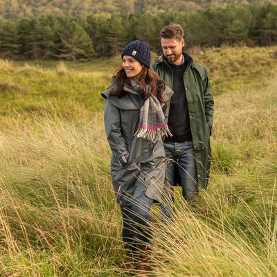 Couple enjoying the outdoors in a Lighthouse Stockman Full Length Waterproof Rain Coat