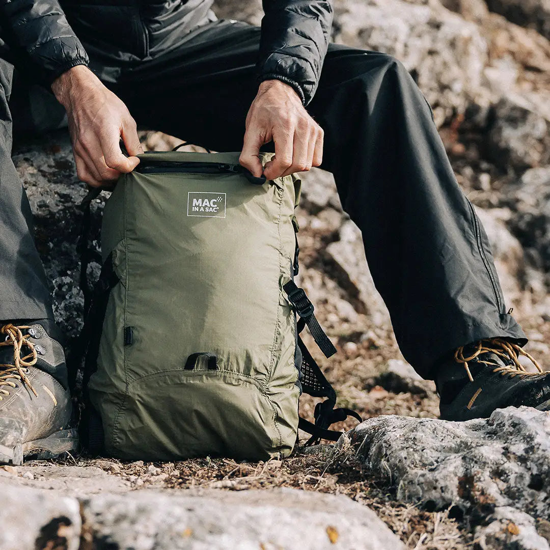 Olive green lightweight Mac in a Sac Travelite Backpack perfect for adventures