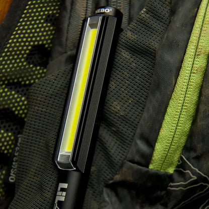LED light bar on dark fabric showcasing the NEBO Lil Larry for versatile lighting