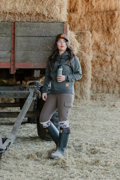 Woman in outdoor apparel wearing New Forest Avon Full Zip Wellington Boots in the forest