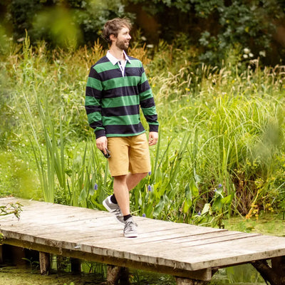 Stylish green black rugby shirt with elegant chino shorts