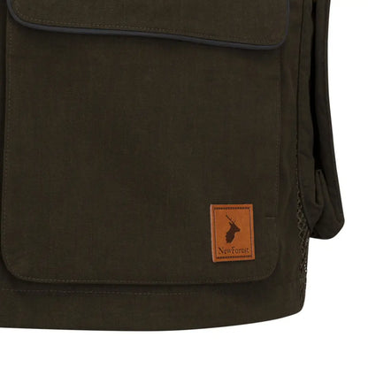 Dark olive green waxed canvas New Forest Dog Training Vest II with tan leather stag patch