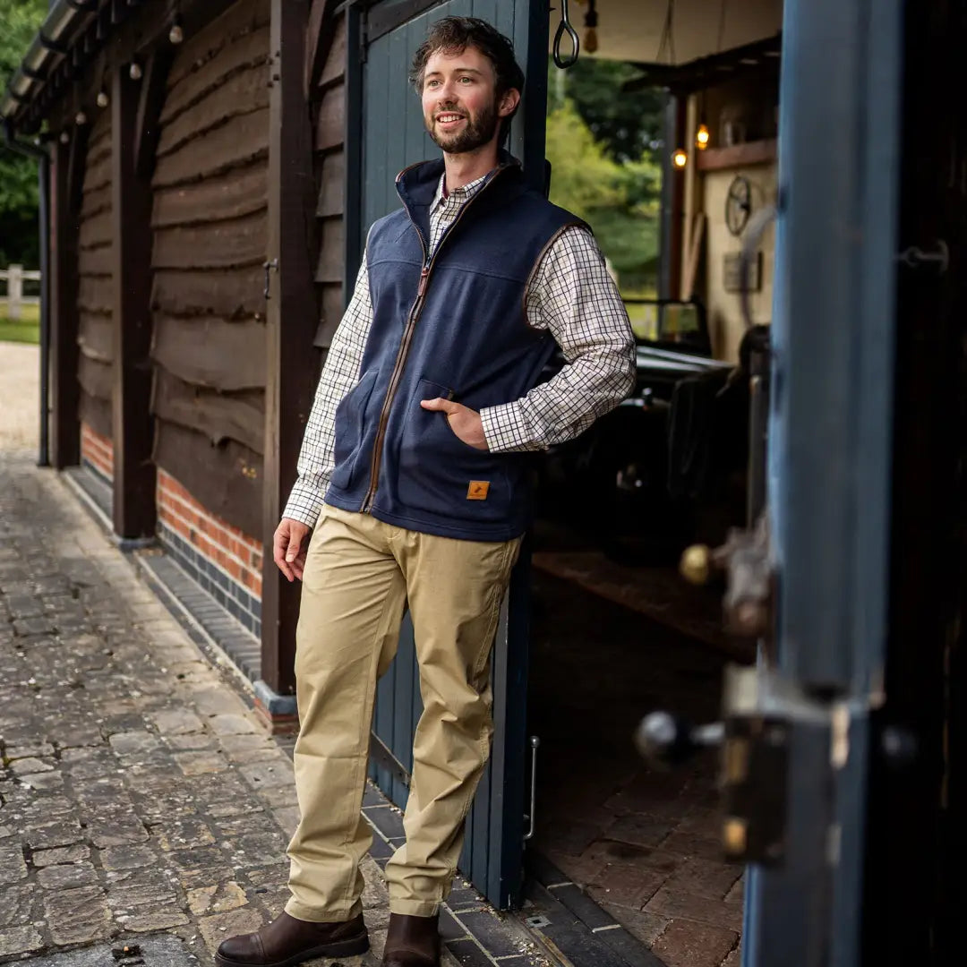 Man wearing New Forest Fleece Gilet in navy, cozy forest fleece vest for outdoors