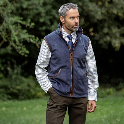 Man wearing a navy fleece gilet from the New Forest Fleece Gilet collection