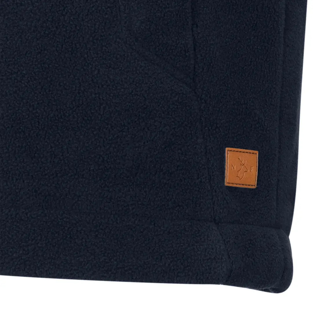 Navy blue Forest Knightwood fleece gilet with brown logo patch for cozy style