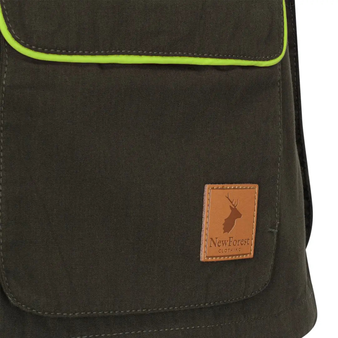 Olive green dog sports vest with neon trim from New Forest Ladies Dog Sports Vest collection