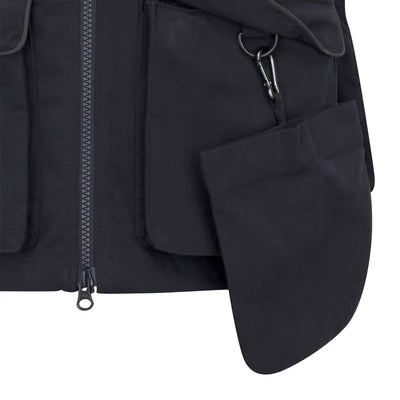 Black New Forest dog training vest with zippered pockets for sessions
