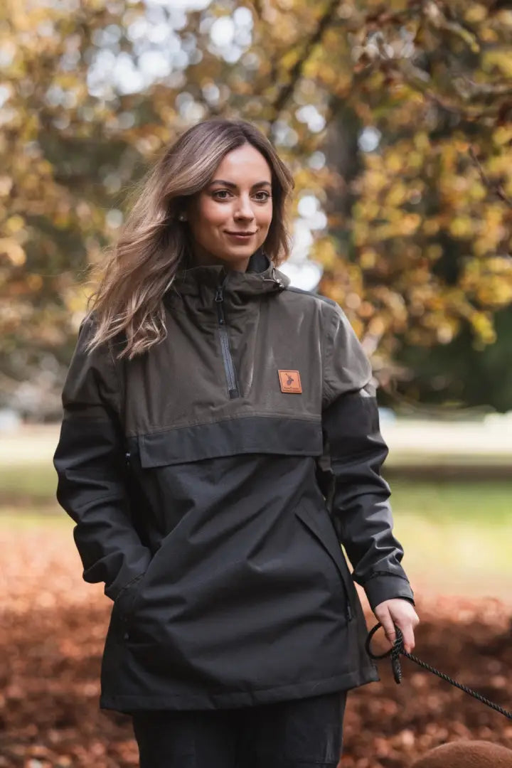 Woman in a two-tone forest nightjar smock with partial zipper and front pocket