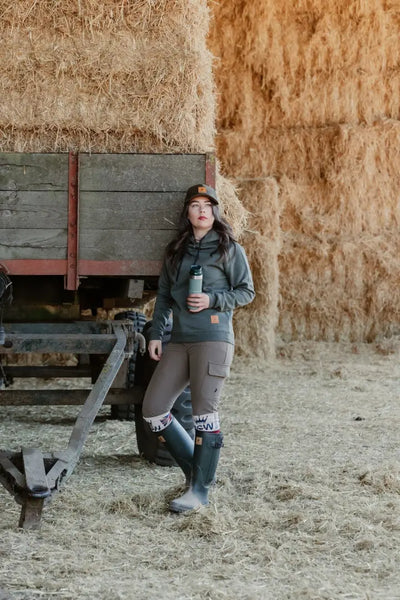 Woman in forest ladies outdoor stretch trousers ready for adventure