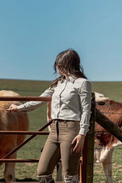 Woman in riding attire wearing New Forest Ladies Outdoor Stretch Trousers perfect for forest ladies outdoor adventures