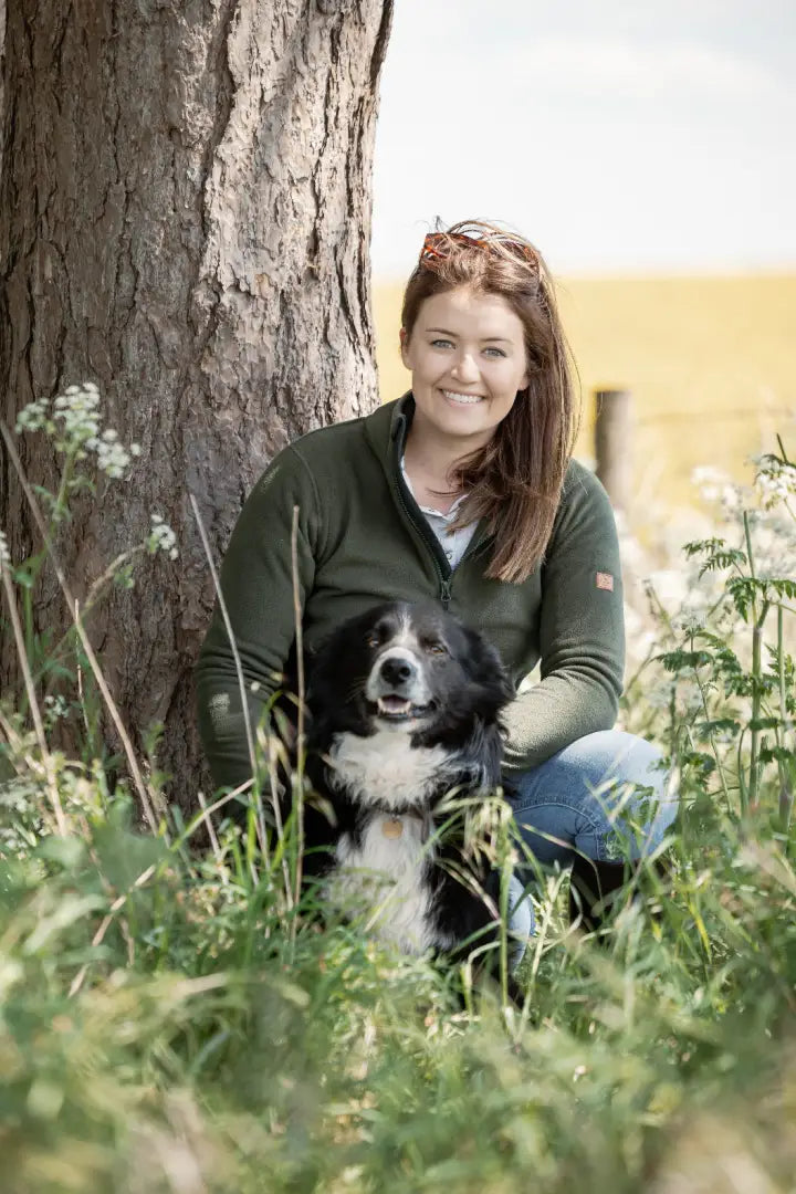 Woman with a Border Collie on forest trail wearing New Forest Ladies Trail Fleece