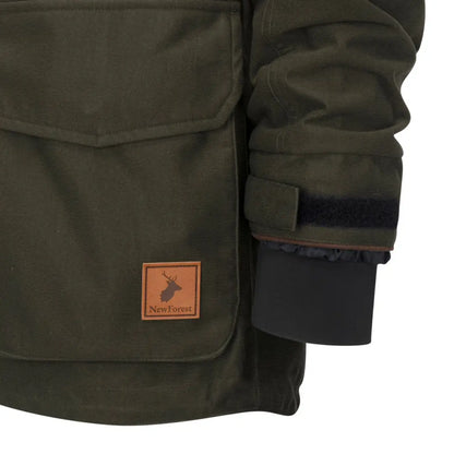 Olive green Forest Marsh jacket with pocket and adjustable cuff for outdoor adventures
