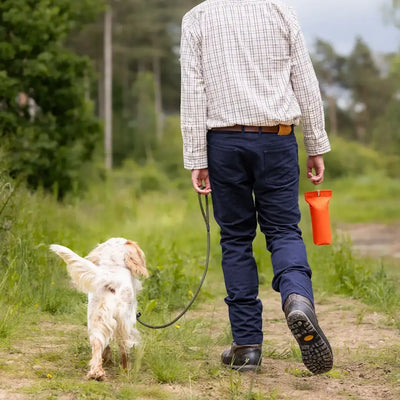 Person walking dog wearing New Forest Moleskin Jeans in forest moleskin style