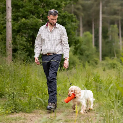 Man walking dog in New Forest Moleskin Jeans showcasing forest moleskin style