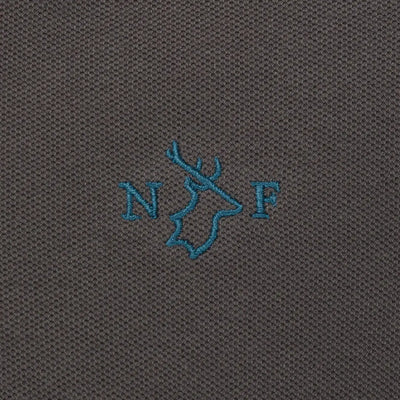 Close-up of embroidered detail on New Forest Pique Polo Shirt showcasing quality pique polo
