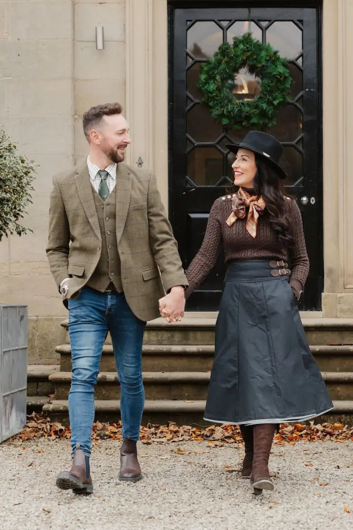 Couple holding hands in a stylish New Forest Premium Wool Tweed Blazer