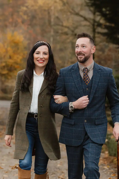 Well-dressed couple outdoors rocking a stylish wool tweed blazer in the New Forest