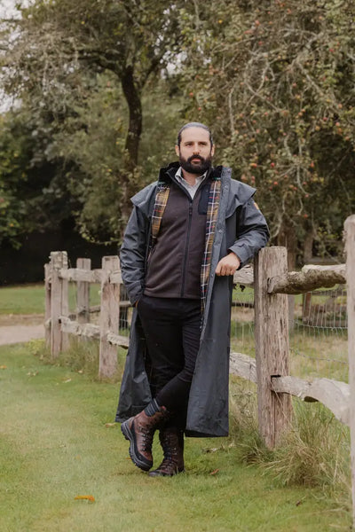 Man in a long coat showcasing the New Forest Ranger Men’s Full Length Waterproof Coat