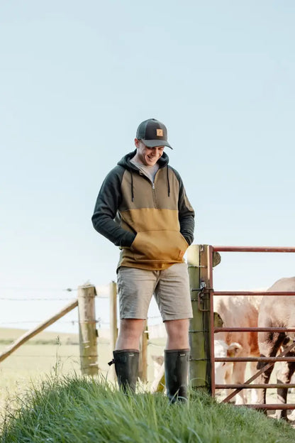 Man in outdoor clothing wearing the New Forest Raptor Hoodie, perfect for forest raptors