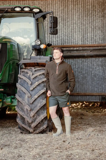 Man in outdoor rugby shorts and country clothing perfect for hunting and adventures