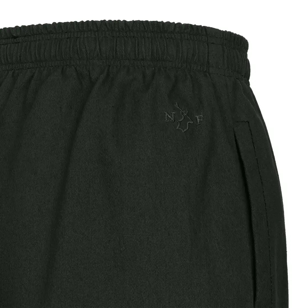 Comfortable black rugby shorts with elastic waistband, perfect for country clothing or hunting