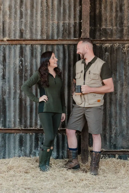 Couple wearing New Forest Trail Shorts in outdoor forest trail adventure