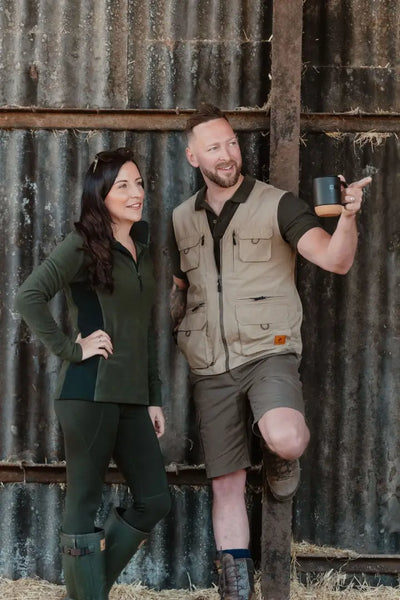 Couple wearing New Forest Trail Shorts for outdoor adventures in forest trail style