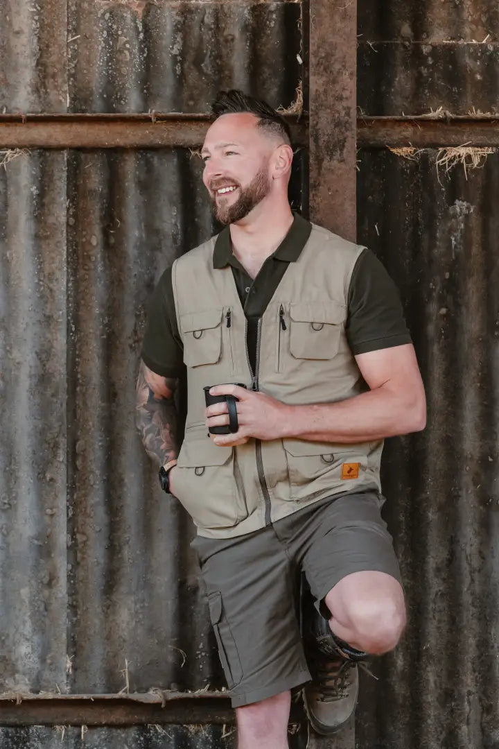 Man in outdoor gear wearing New Forest Trail Shorts for forest trail adventures