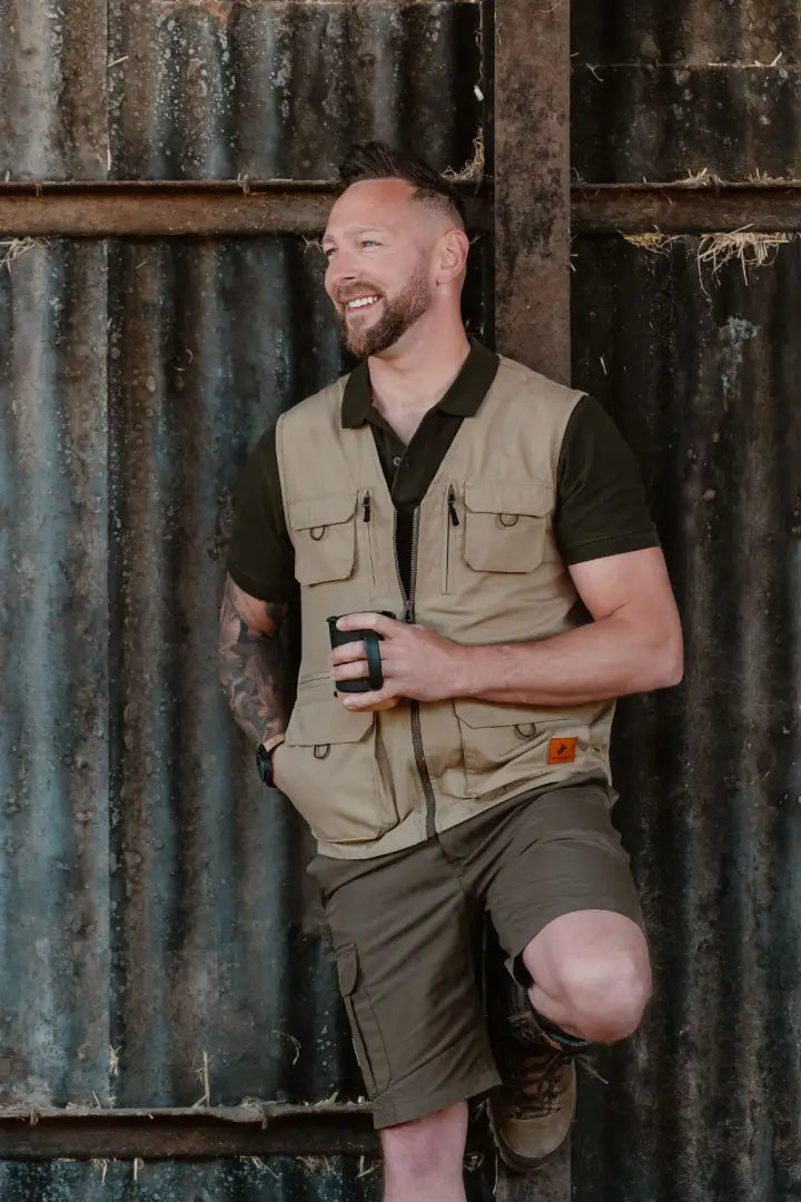Man in khaki explorer gilet and shorts, perfect for forest explorer adventures