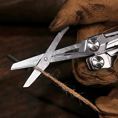 NexTool Flagship Captain multi tool with silver blades, black handles, leather gloves