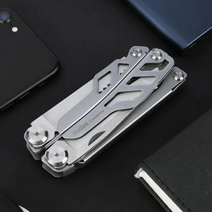Compact NexTool Flagship Pro multi-tool in silver leather with black accents