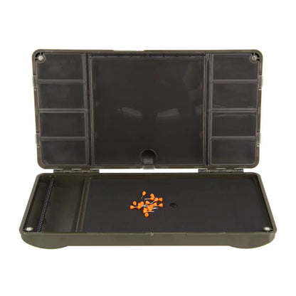 Open olive-green NGT XPR PLUS Box showing orange bobbers, a compact tackle box designed to hold readymade hair