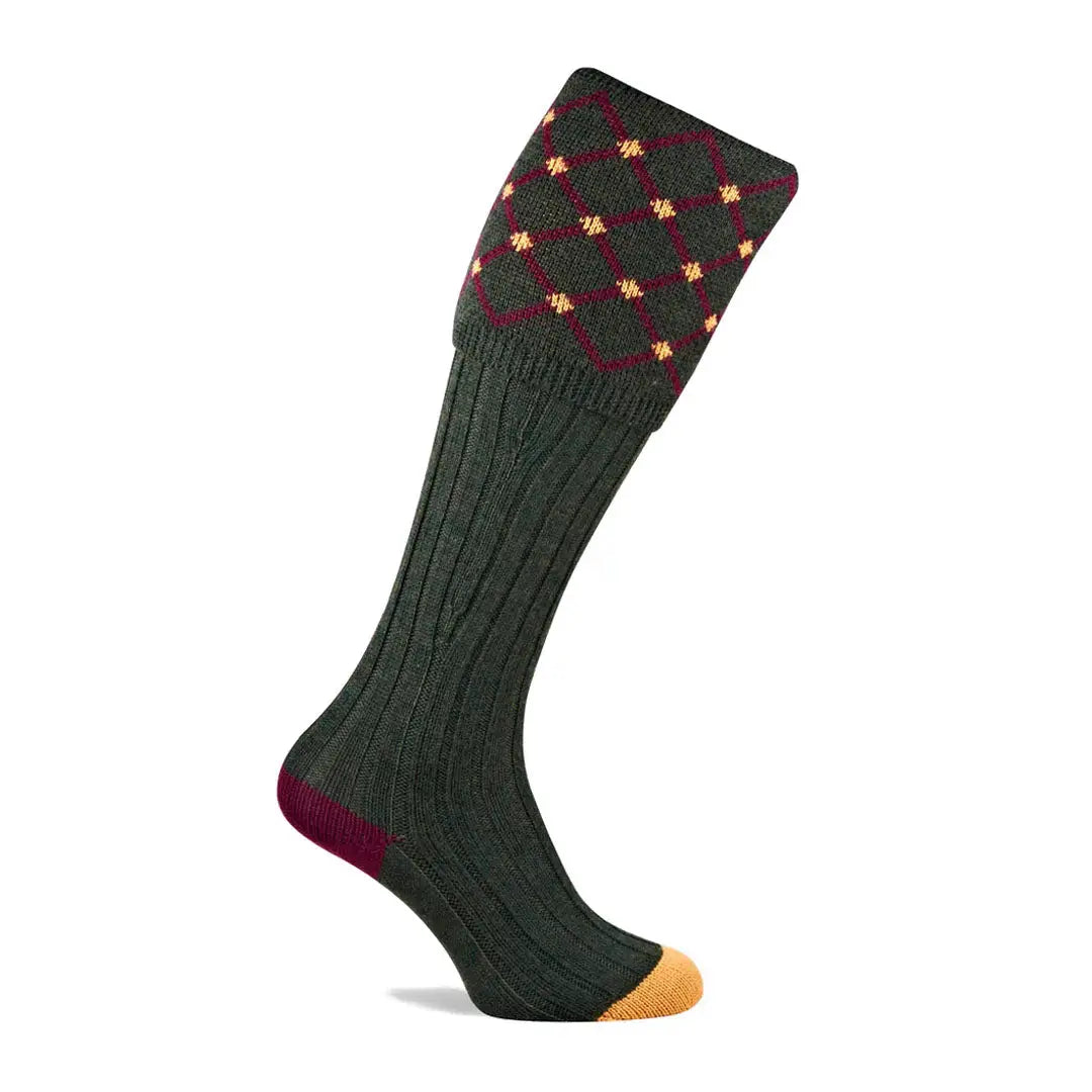 Knee-high green argyle sock made from extra fine merino for ultimate comfort