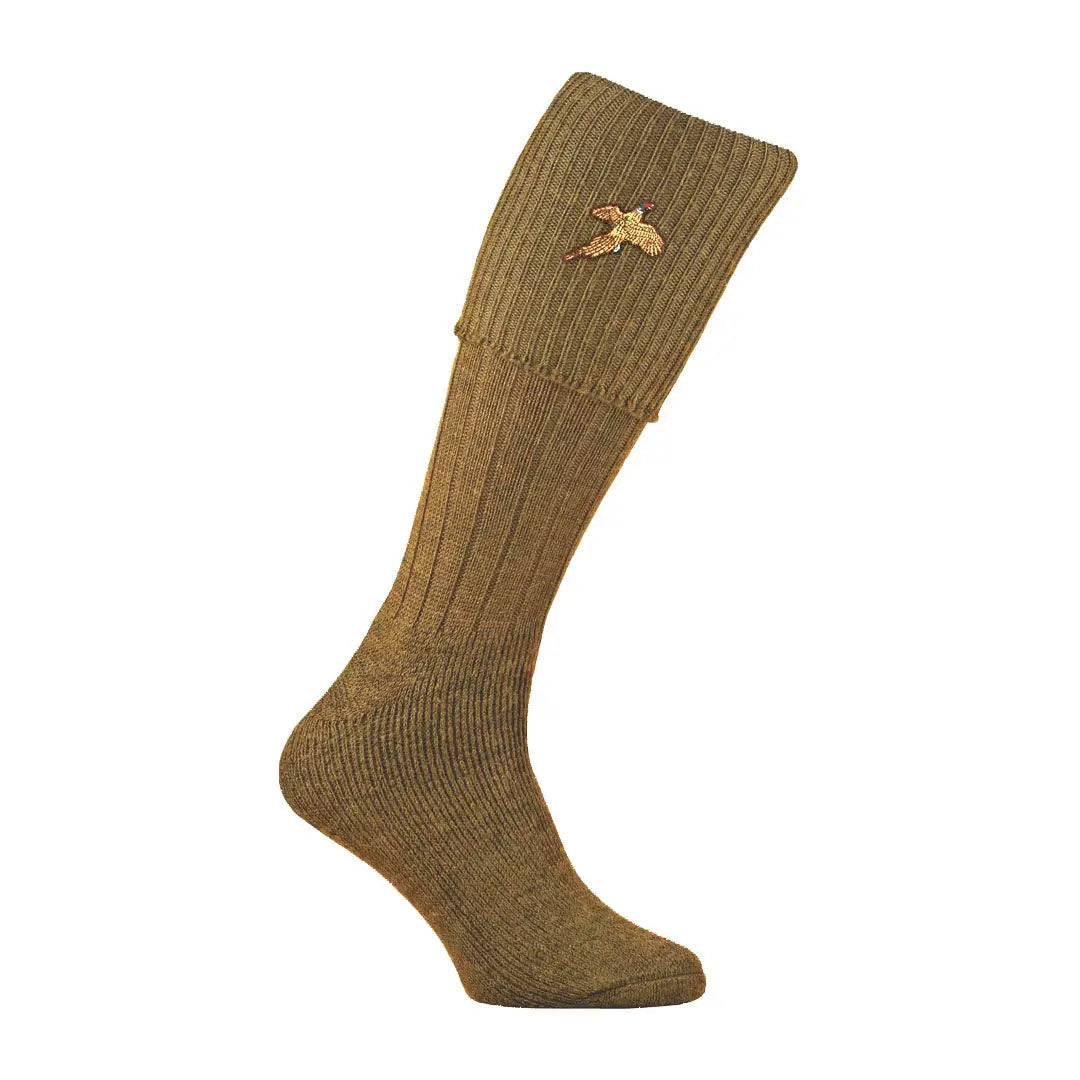 Knee-high brown wool Pennine Stalker Socks with bird emblem for outdoor adventures