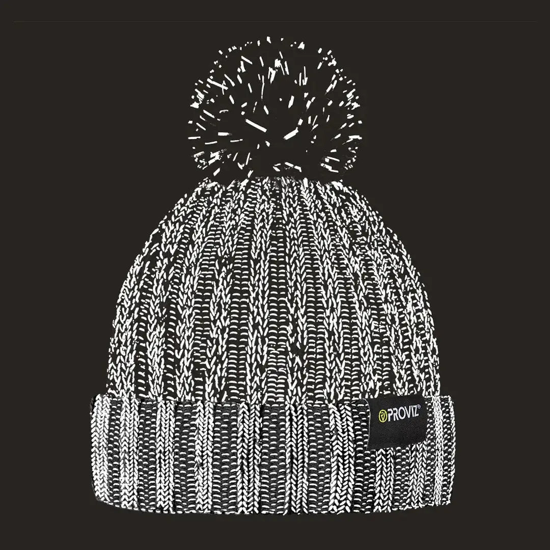 Black and white speckled bobble beanie with fluffy pom-pom for hunting