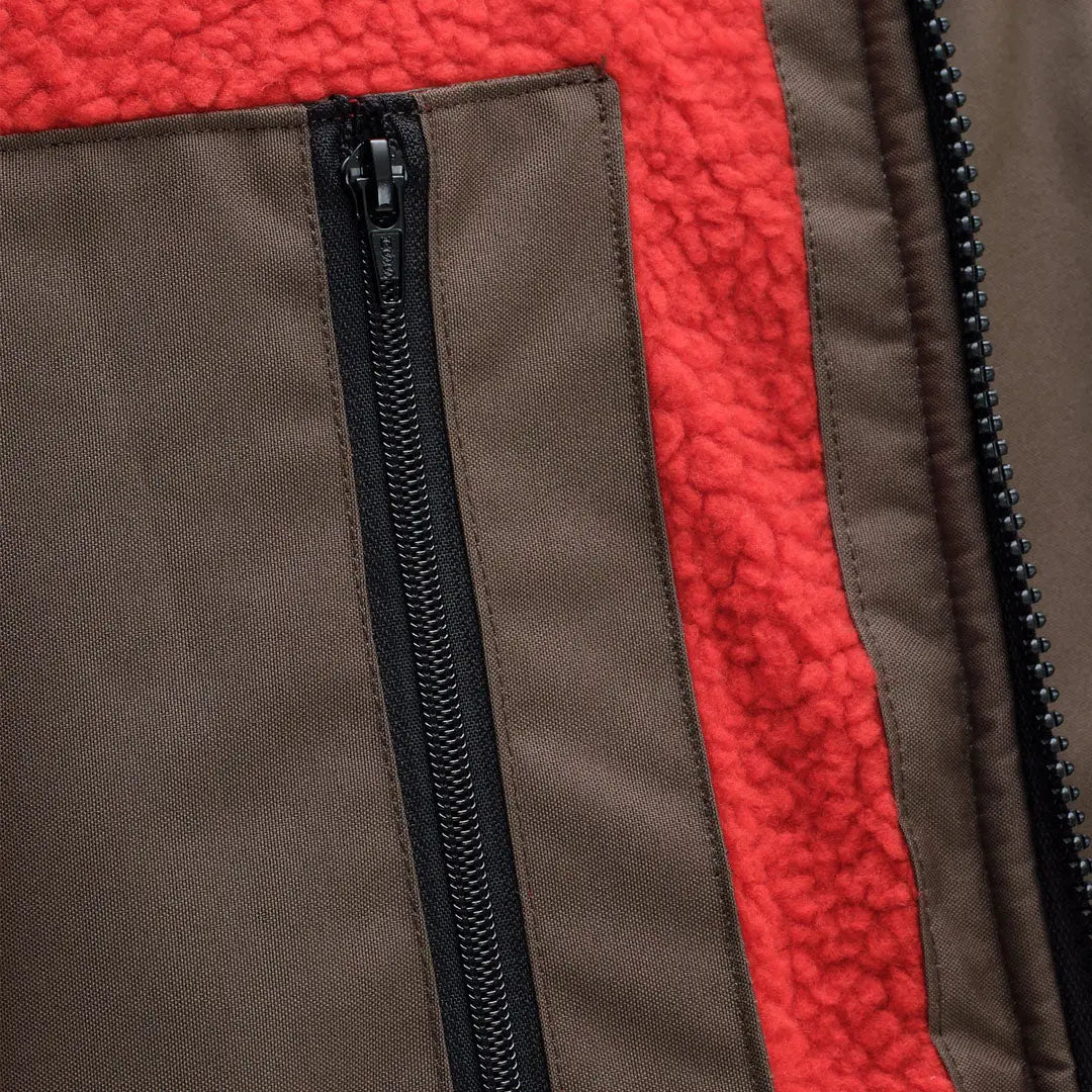 Redback Robe country hunting jacket with brown outer, red fleece lining, black zippers