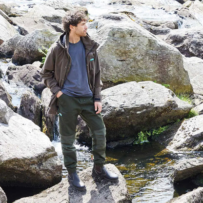 Man in outdoor clothing wearing Ridgeline Cambrian Trousers for all-day wear in worst weather