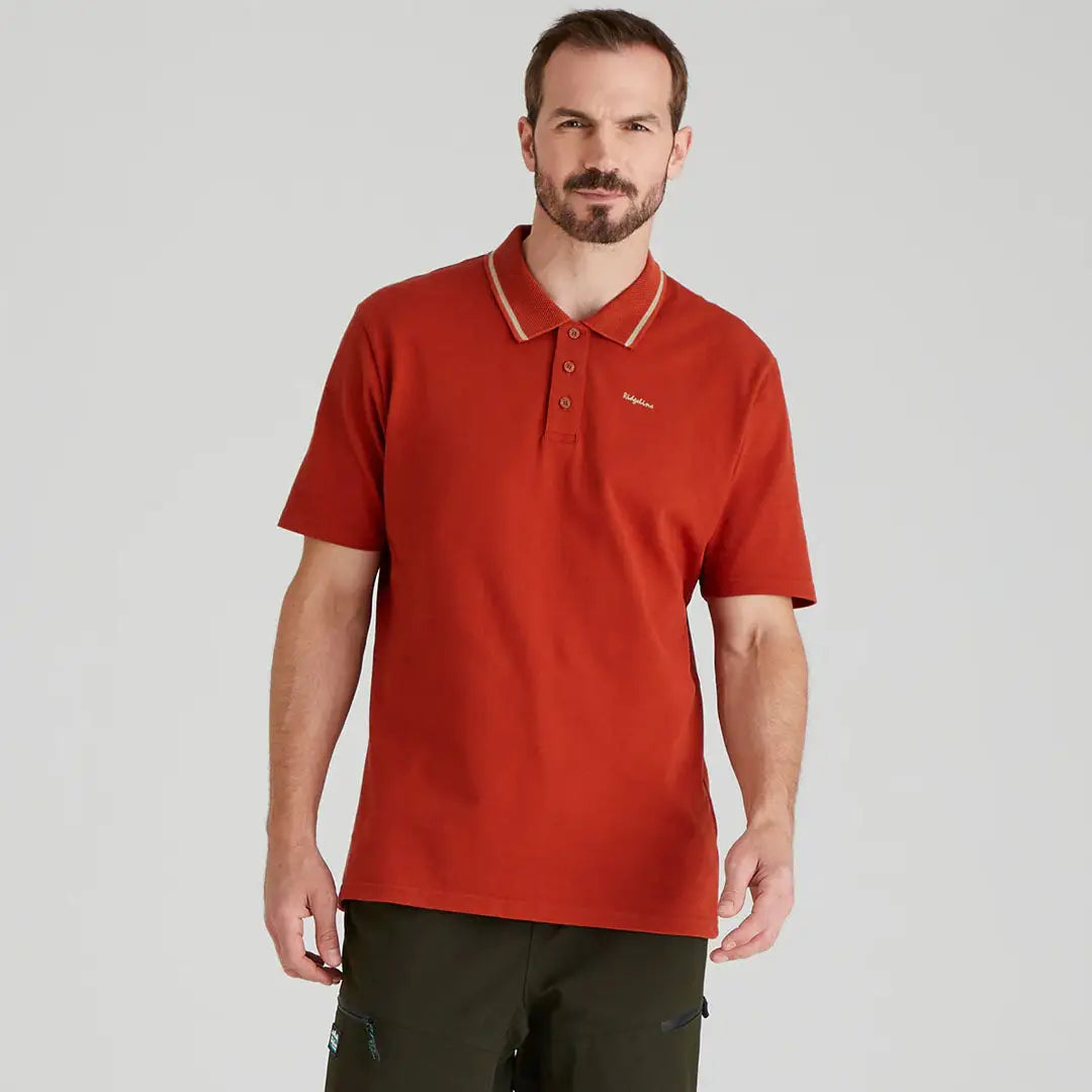 Red polo shirt from Ridgeline Kilworth Polo Top collection perfect for casual wear
