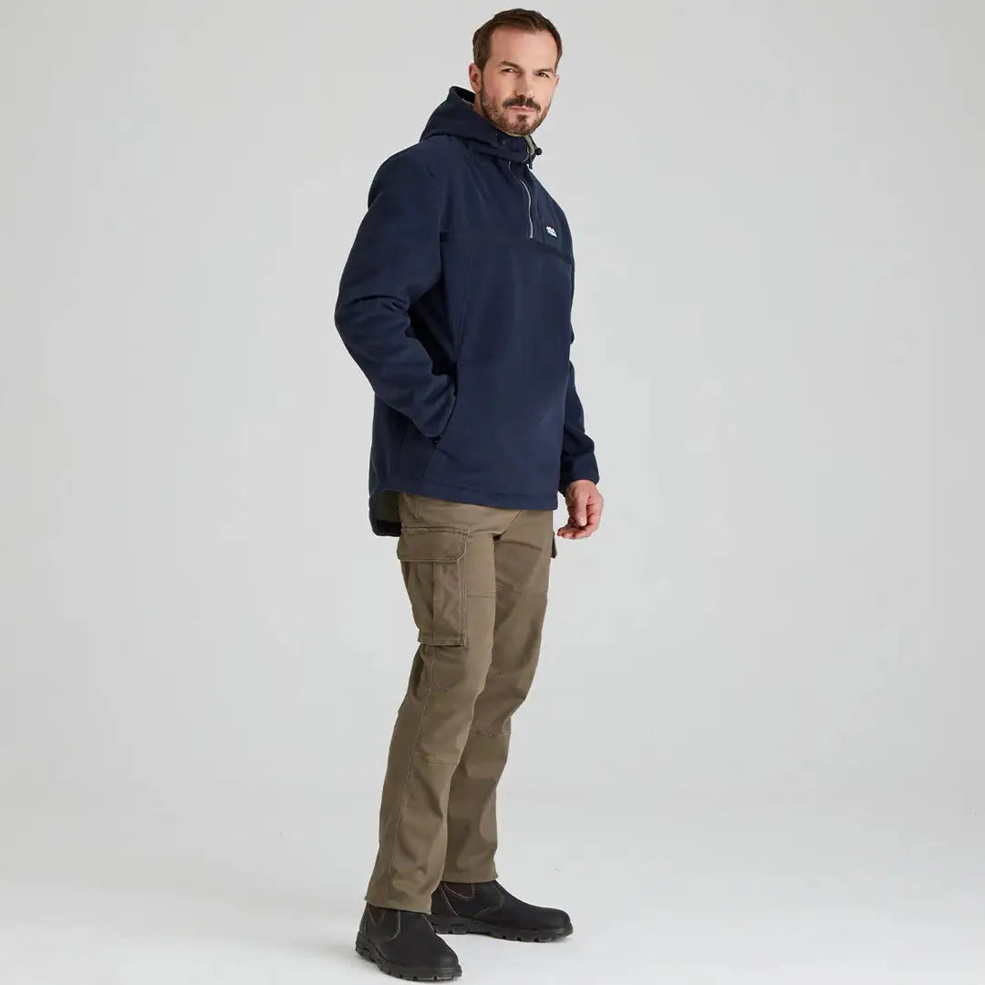 Man in navy hooded anorak and olive cargo pants wearing Ridgeline Kodiak fleece