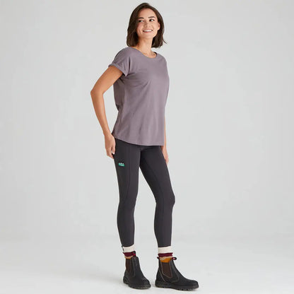 Woman wearing Ridgeline Ladies Infinity Leggings in gray with dark leggings and black boots