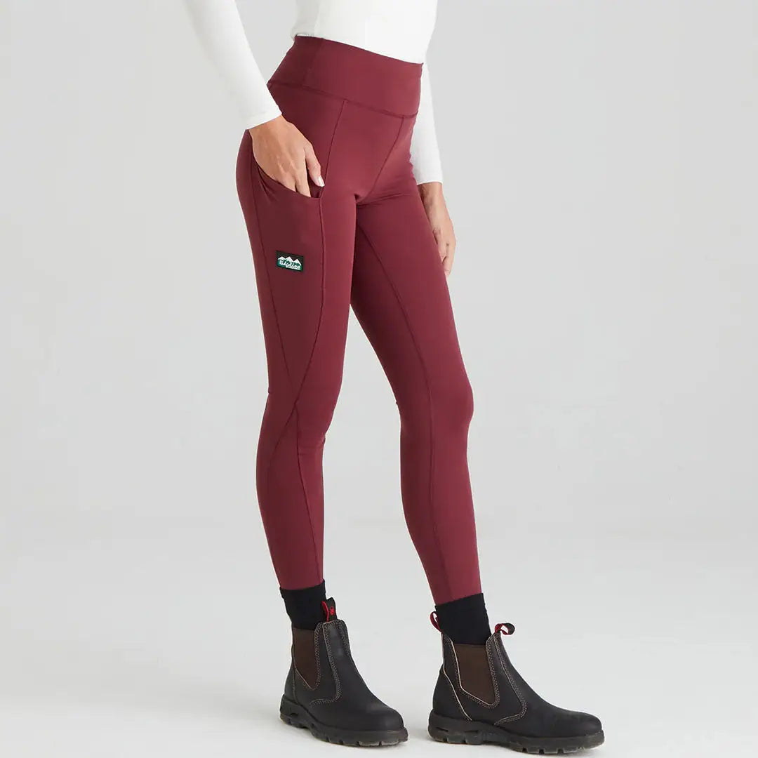 Burgundy infinity leggings with pockets and black boots, perfect country clothing