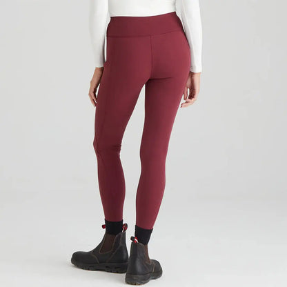 Ridgeline Ladies Infinity Leggings in Burgundy with black boots for stylish athletic wear